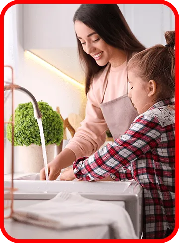 mother and child washing hands